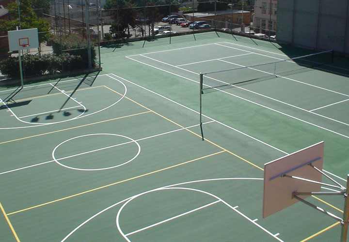 basketball court and tennis court with green sealcoat
