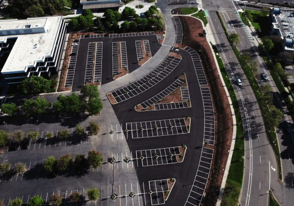 An asphalt parking lot that DRYCO constructed. Learn if asphalt or concrete is better for parking lot construction here!